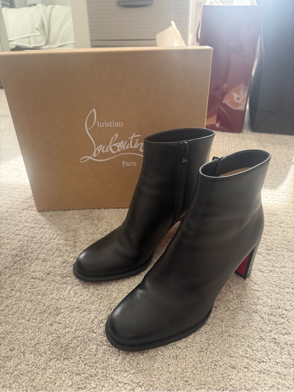 Christian Louboutin Black Leather Ankle Boots with Red Sole